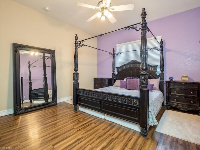 bedroom featuring hardwood / wood-style floors and ceiling fan