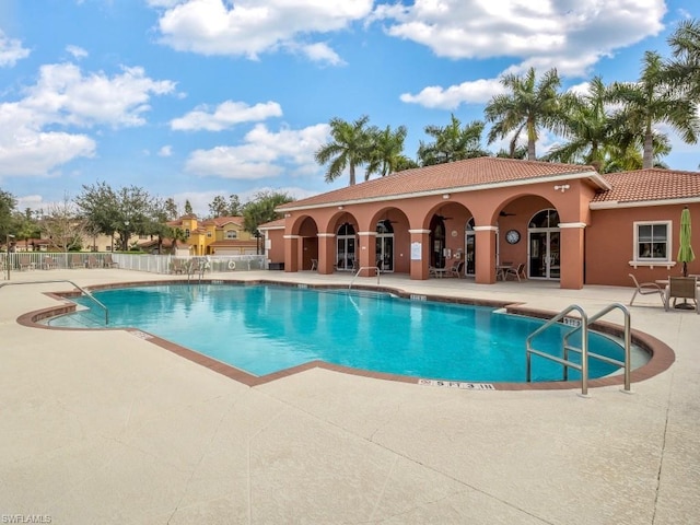 view of swimming pool featuring a patio