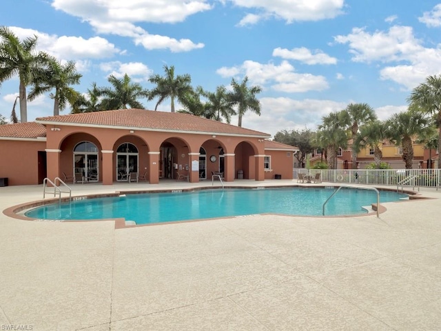 view of pool featuring a patio area