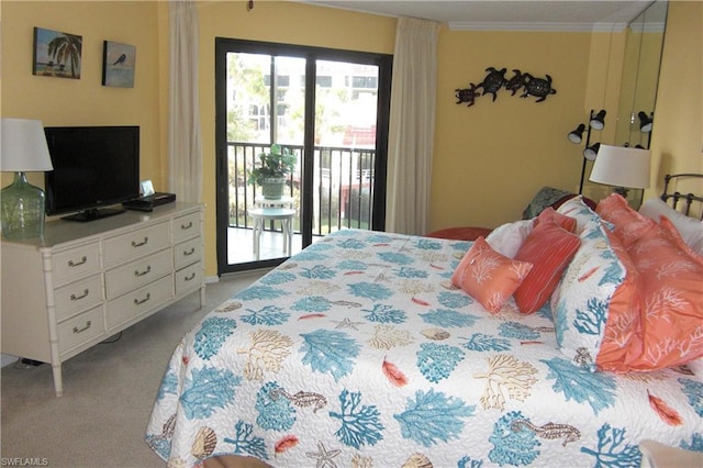 carpeted bedroom featuring access to outside and ornamental molding