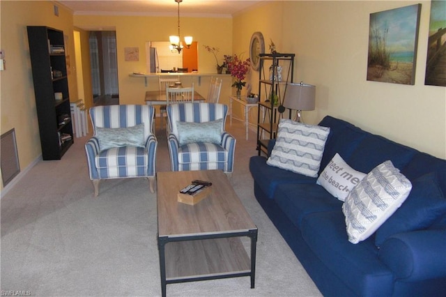 carpeted living room with a chandelier and crown molding