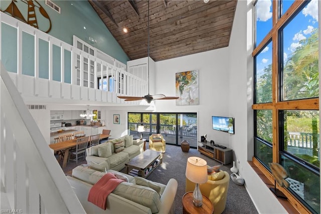 living room featuring ceiling fan, carpet flooring, high vaulted ceiling, and wood ceiling