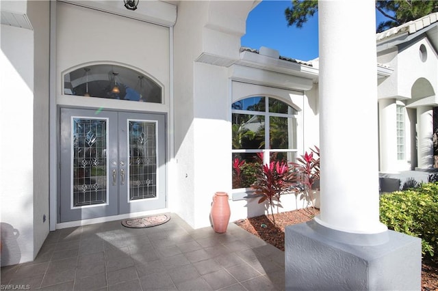 entrance to property featuring french doors