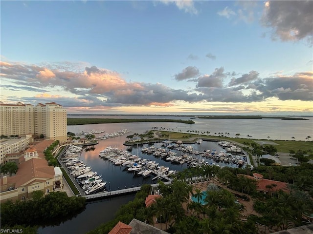 aerial view at dusk with a water view