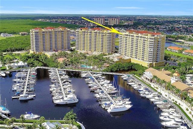 birds eye view of property featuring a water view