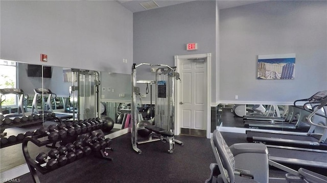 gym with a high ceiling