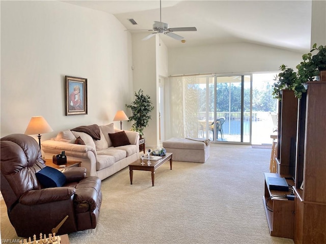 living room with light colored carpet, ceiling fan, and lofted ceiling