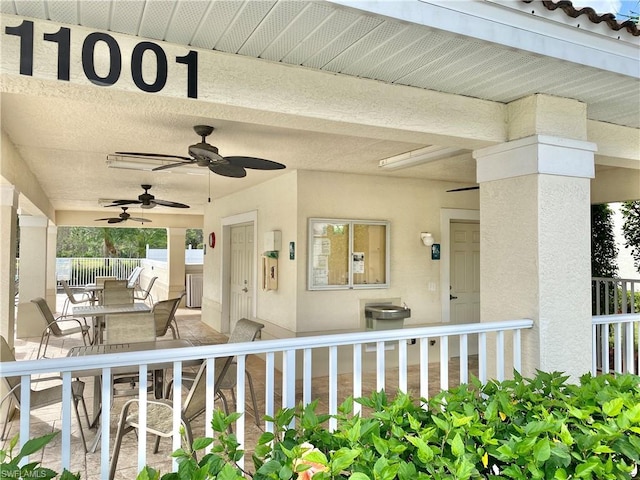 view of patio / terrace featuring ceiling fan