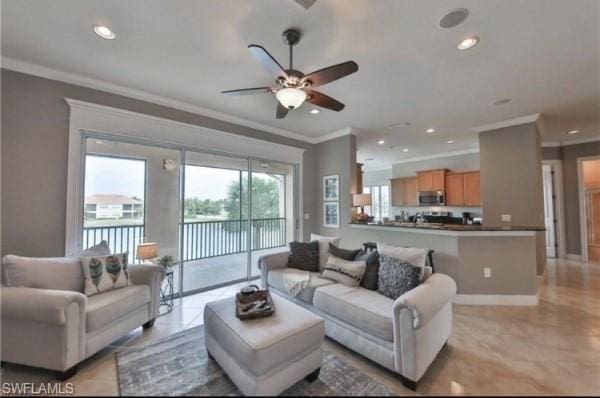 tiled living room with crown molding and ceiling fan