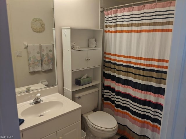 bathroom with toilet and oversized vanity