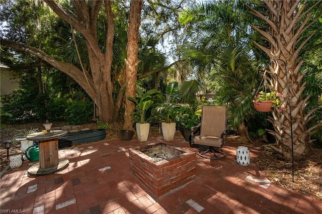 view of terrace featuring a fire pit