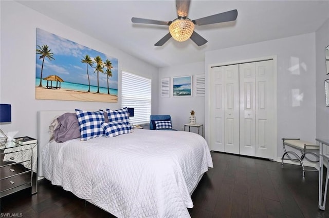 bedroom with a closet, ceiling fan, and dark hardwood / wood-style floors