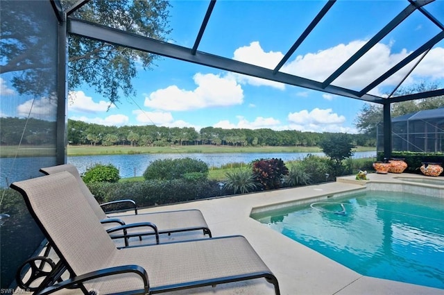 view of pool with a lanai and a patio