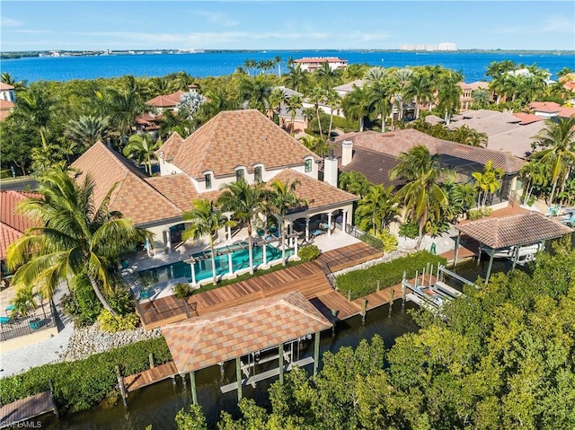 drone / aerial view with a water view