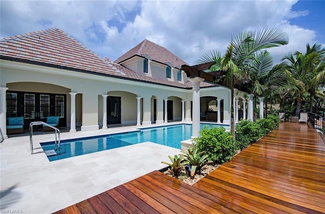 view of pool featuring a patio area