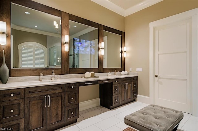 bathroom featuring a notable chandelier, tile flooring, crown molding, and dual bowl vanity