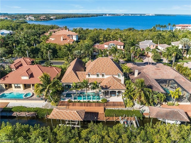 bird's eye view with a water view