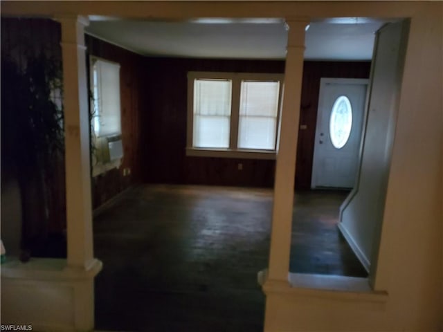 foyer featuring decorative columns