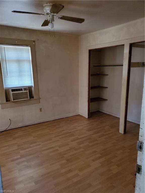 unfurnished bedroom featuring light hardwood / wood-style floors and ceiling fan