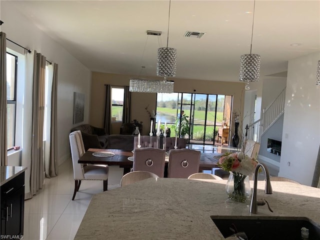 interior space with a water view and sink