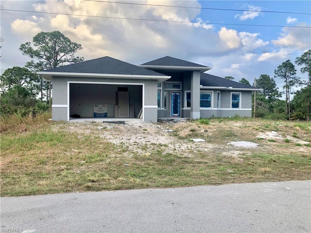 view of front of home with a garage