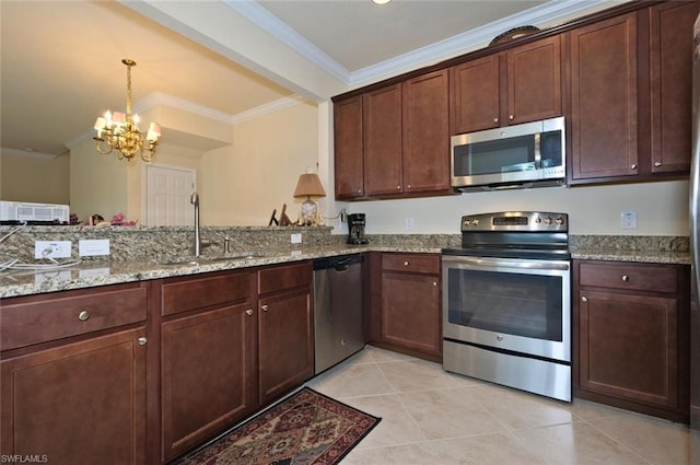 kitchen featuring sink, light tile floors, hanging light fixtures, appliances with stainless steel finishes, and a chandelier