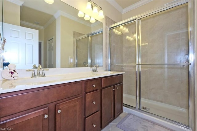 bathroom featuring ornamental molding, dual bowl vanity, tile flooring, and walk in shower