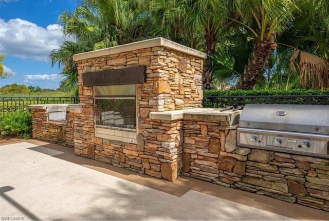 view of patio featuring grilling area and an outdoor kitchen