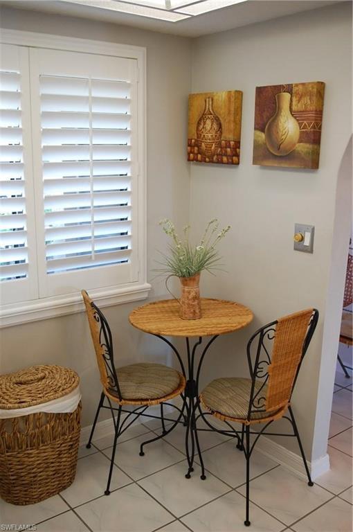 dining room featuring light tile floors