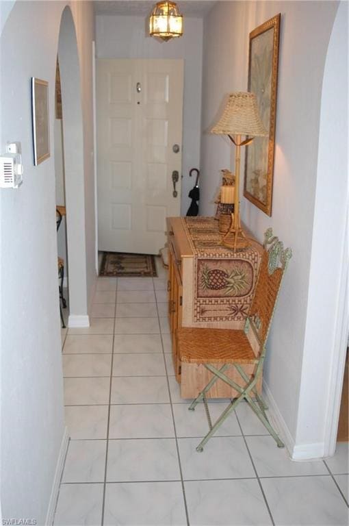 entryway with light tile floors