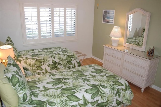 bedroom featuring light hardwood / wood-style flooring