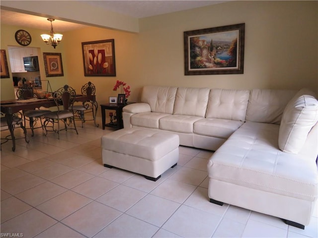 tiled living room featuring a notable chandelier