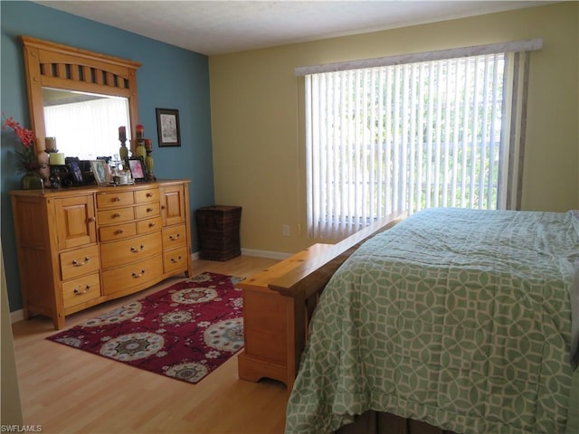 bedroom featuring light hardwood / wood-style floors