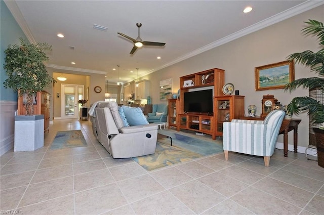 tiled living room featuring crown molding and ceiling fan