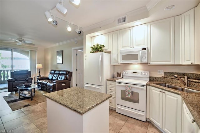 kitchen with white appliances, crown molding, ceiling fan, and sink