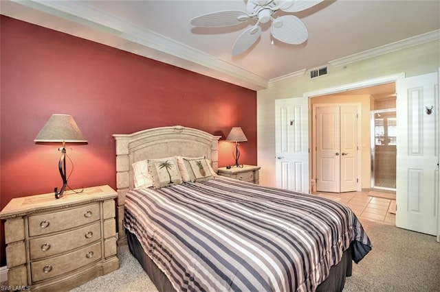 bedroom with crown molding, ceiling fan, and light colored carpet