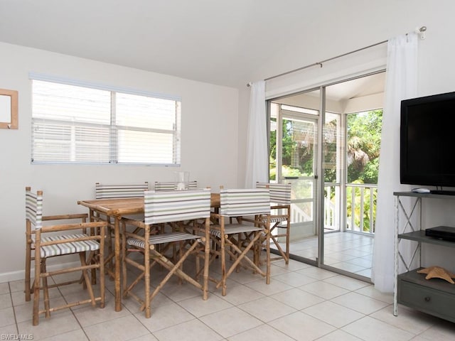 tiled dining area with a wealth of natural light