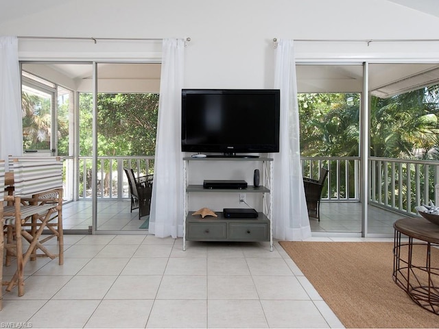 tiled living room with vaulted ceiling