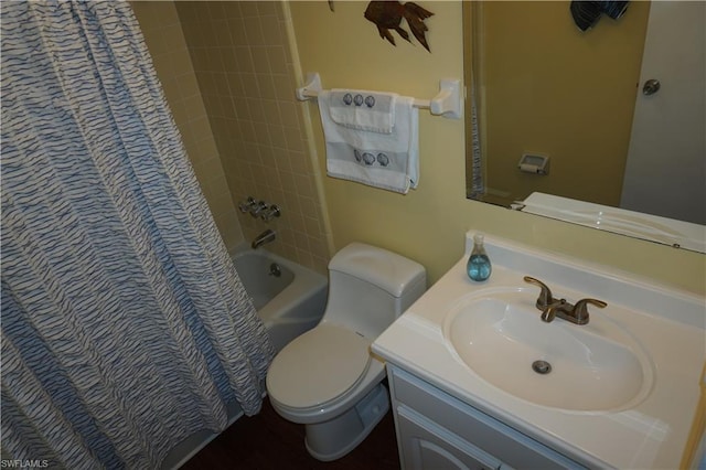 full bathroom featuring toilet, vanity, and shower / tub combo with curtain