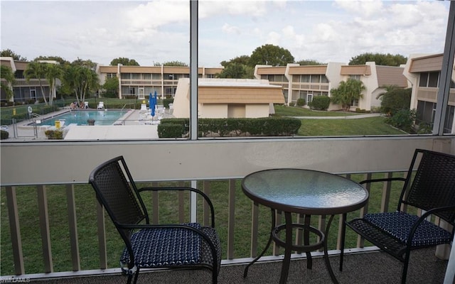 balcony with a community pool