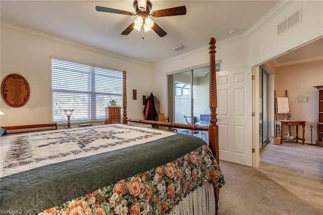 carpeted bedroom with ornamental molding, a closet, and ceiling fan