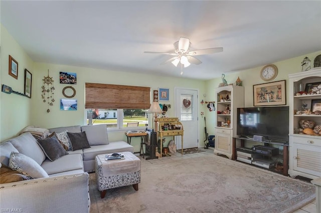 living room featuring ceiling fan