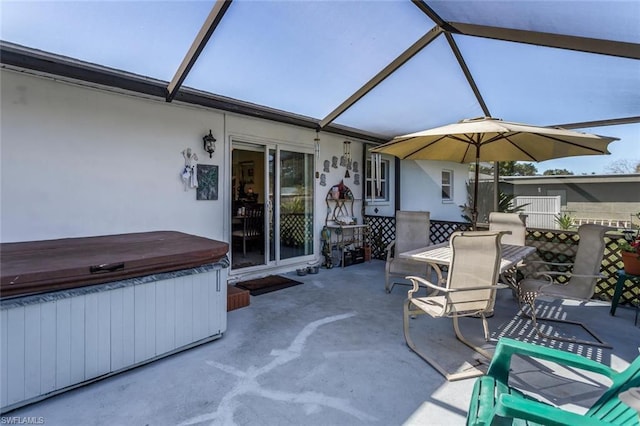 view of patio / terrace featuring a hot tub