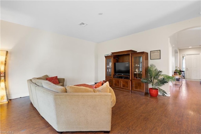 living room with dark wood-type flooring