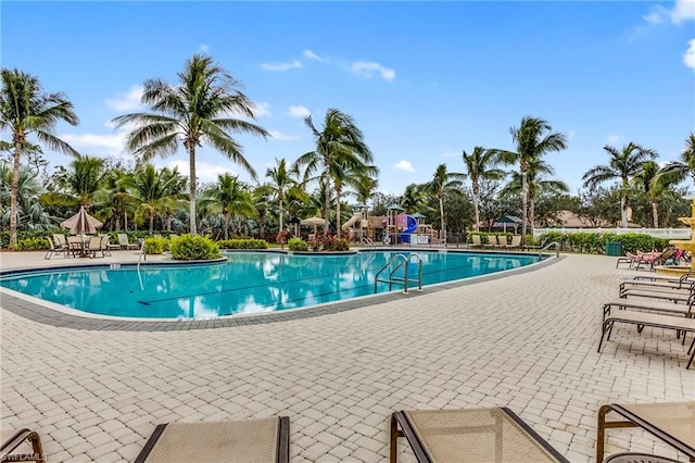 view of swimming pool featuring a patio area