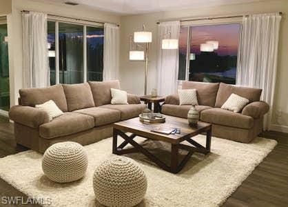 living room with dark wood-type flooring