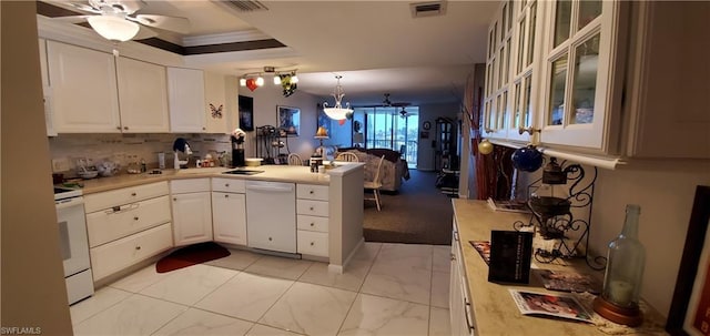 kitchen featuring kitchen peninsula, white appliances, ceiling fan, decorative light fixtures, and white cabinetry