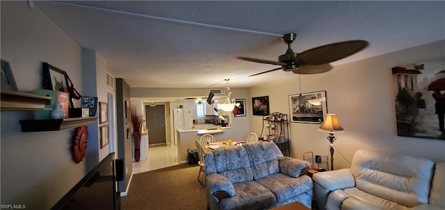 carpeted living room featuring ceiling fan