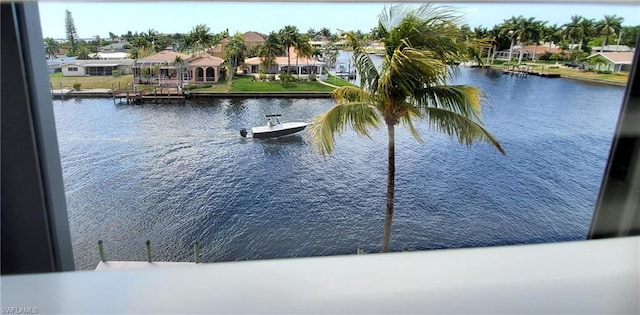 view of dock with a water view