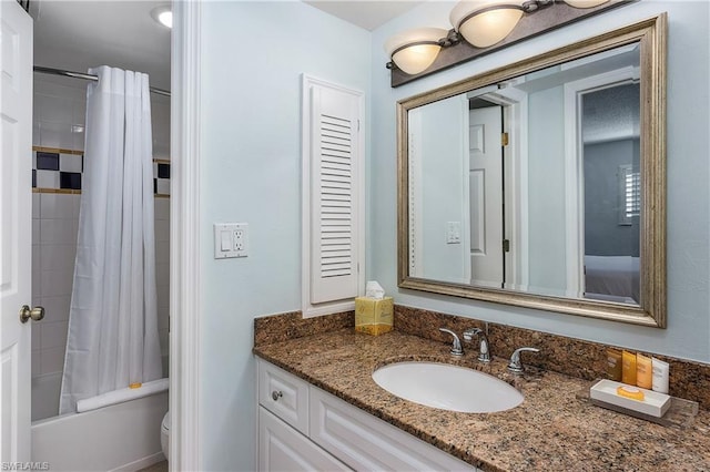 full bathroom featuring shower / bath combination with curtain, toilet, and vanity